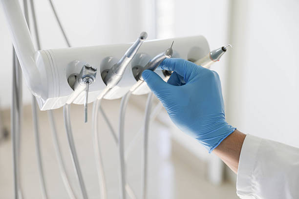 Professional Tooth Extraction technician working in Carlinville, IL